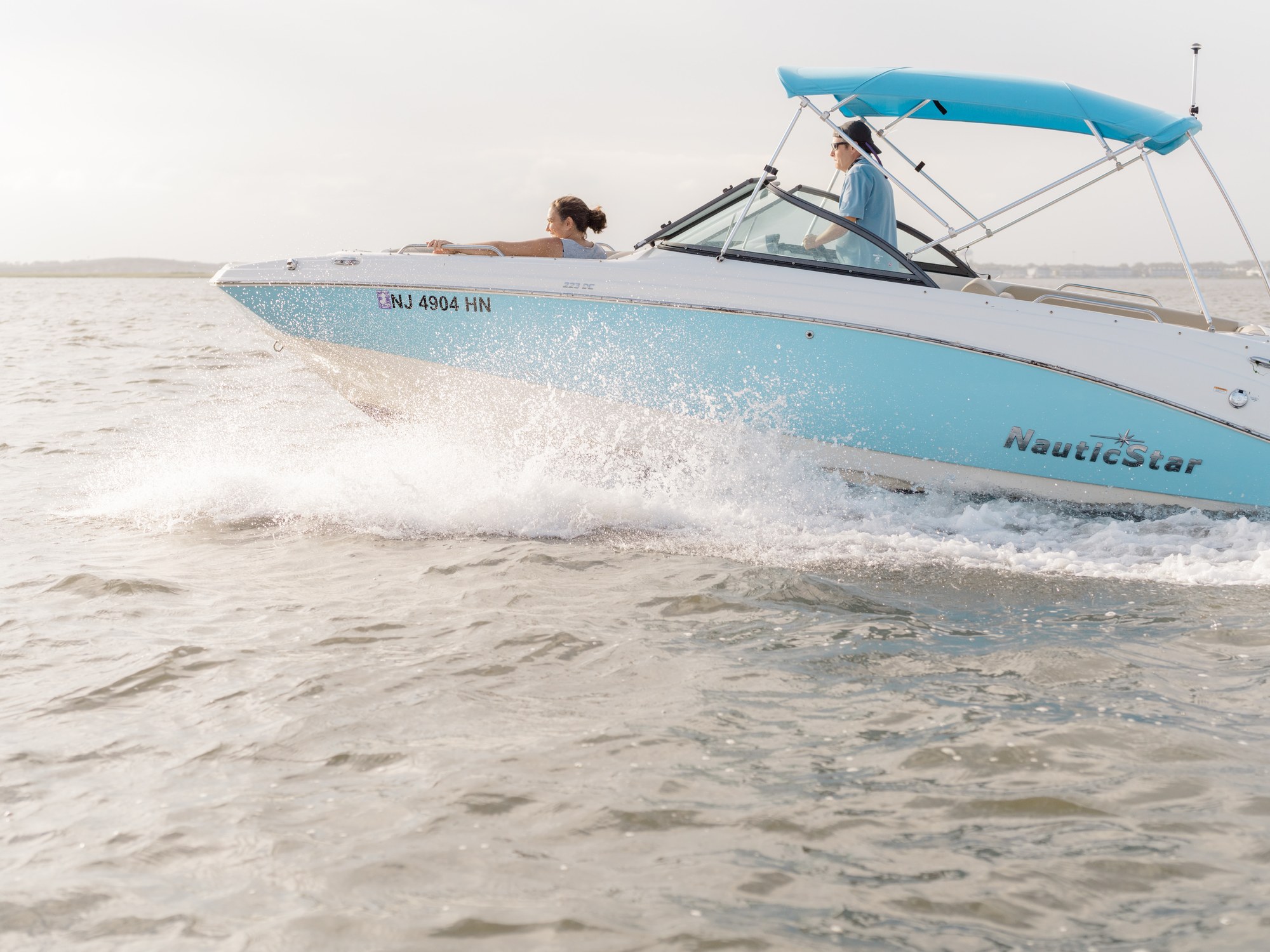 NauticStar boat underway on a family boat day near Ocean City NJ